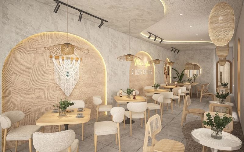 Quán cà phê phong cách hiện đại với nội thất gỗ sáng tạo và đèn trang trí ấm cúng, tạo không gian thư giãn.