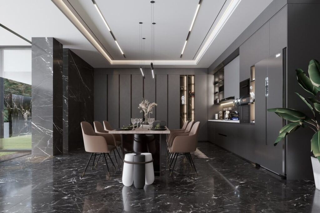 Phòng bếp hiện đại với bàn ăn, ghế da nâu, nội thất đen bóng và cây xanh trang trí.