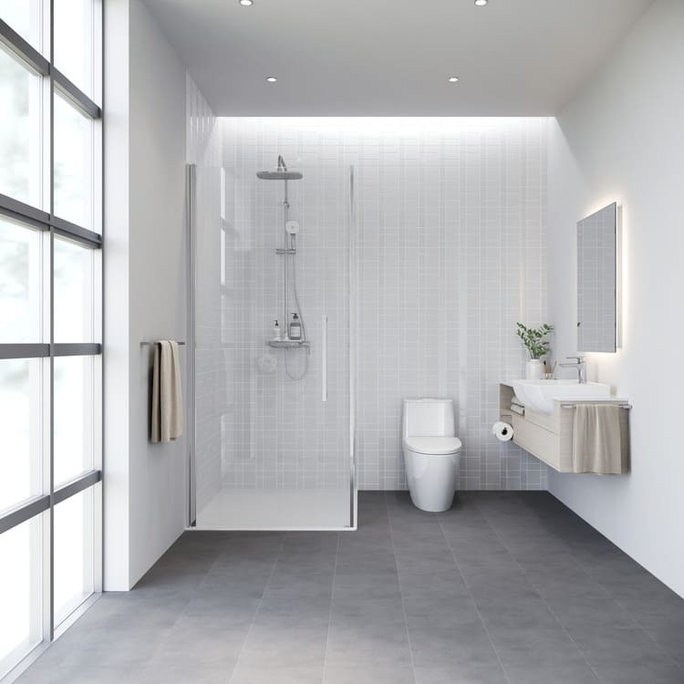 nguyen-tac-thiet-ke-phong-tam-nho-3m2-dep-rong-rai-hon-1 Phòng tắm hiện đại với vòi sen kính và bồn cầu trắng, thiết kế tối giản, ánh sáng tự nhiên chan hòa.