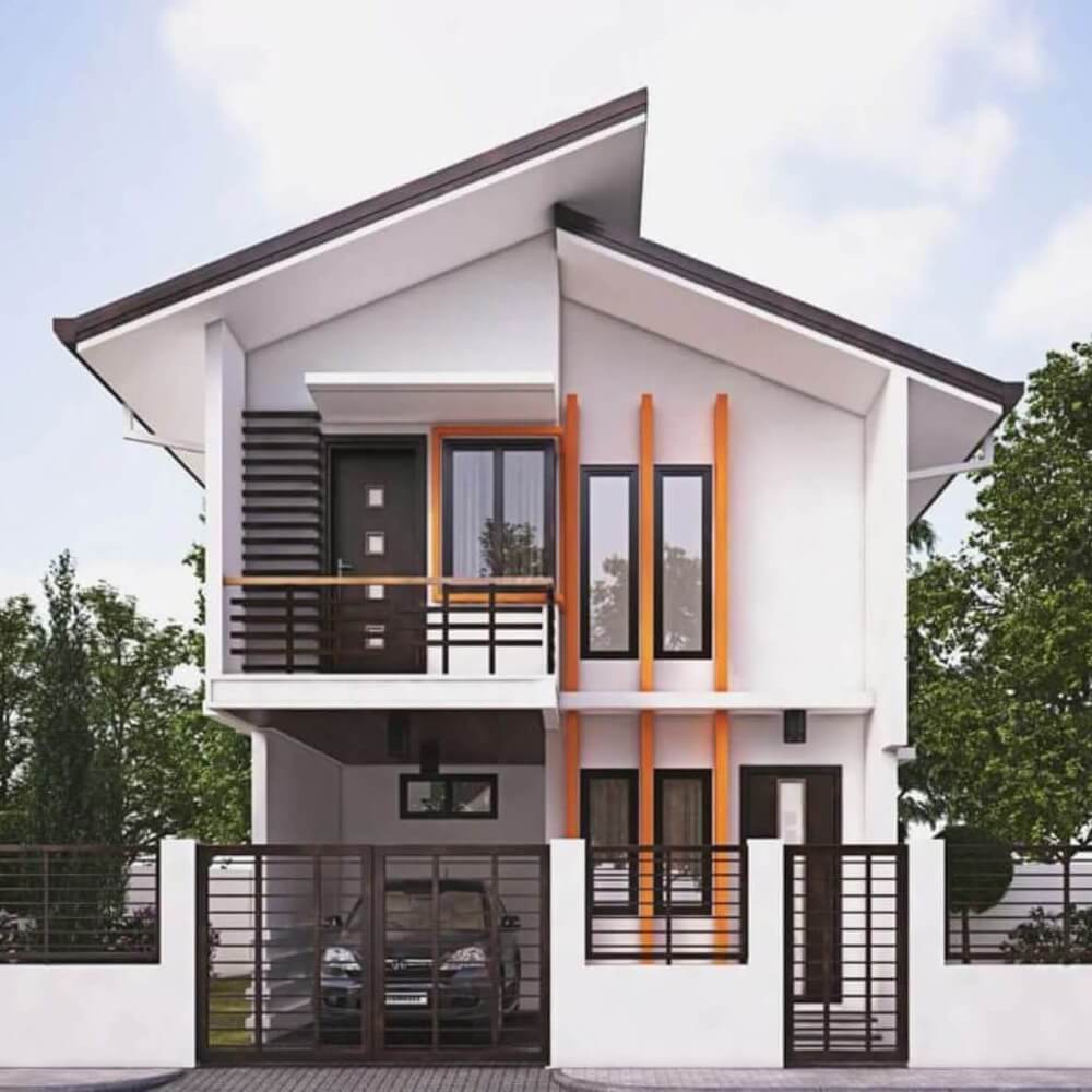 Nhà hai tầng hiện đại với mái chéo, cửa kính lớn và ban công, màu trắng và cam nổi bật.