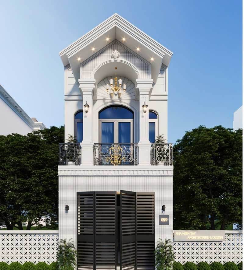 Mặt tiền nhà phố hiện đại với thiết kế cửa sắt và lan can ban công, cây xanh xung quanh.