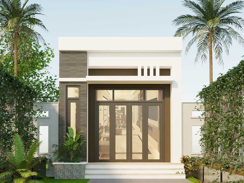 Nhà cấp 4 hiện đại với cửa kính lớn, cây xanh xung quanh và không gian mở trước cửa.