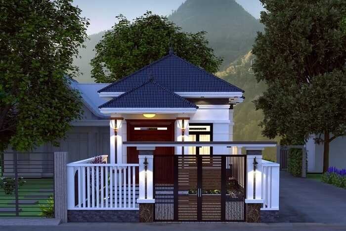 nha-cap-4-6c39715-mai-thai-sang-trong-3 Nhà cấp 4 với mái ngói xanh, sân vườn rộng và cổng sắt phía trước, nằm giữa không gian núi non xanh mát.