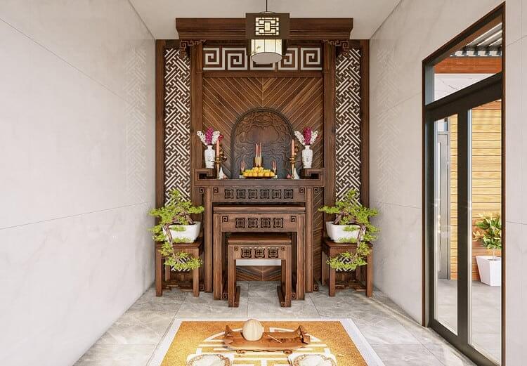 Bàn thờ gia tiên bằng gỗ trang trí đẹp mắt, có hoa và nến, phong cách truyền thống trong không gian sáng sủa.