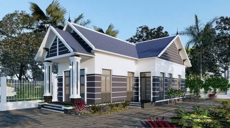 Nhà cấp 4 mái Thái hiện đại với sân vườn rộng rãi, mang phong cách nông thôn Việt Nam, xanh và thoáng mát.