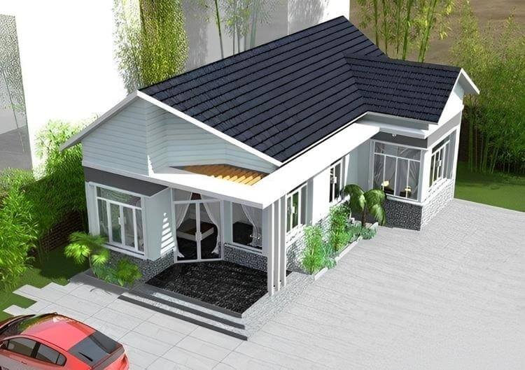 Nhà cấp 4 hiện đại với mái ngói xanh và sân vườn, có cây cảnh và đường lát gạch.