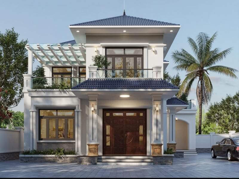 Ngôi nhà hiện đại với mái ngói xanh, cây cọ phía trước, phong cách kiến trúc đẹp mắt và sân rộng.
