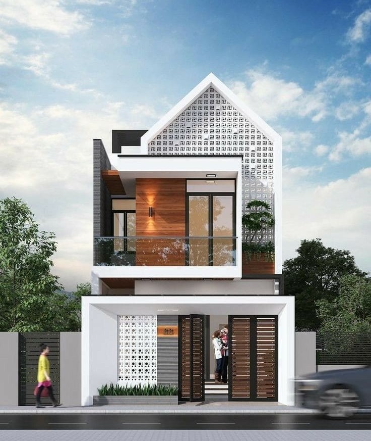 nha-may-lech-2-tang-2-1 Mẫu nhà phố hiện đại hai tầng với thiết kế đẹp, cửa kính lớn, tường gạch thông gió, và cây xanh xung quanh.