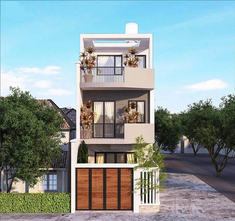 Nhà phố hiện đại 3 tầng với ban công rộng và cây xanh bao quanh, thiết kế tối giản và tiện nghi.