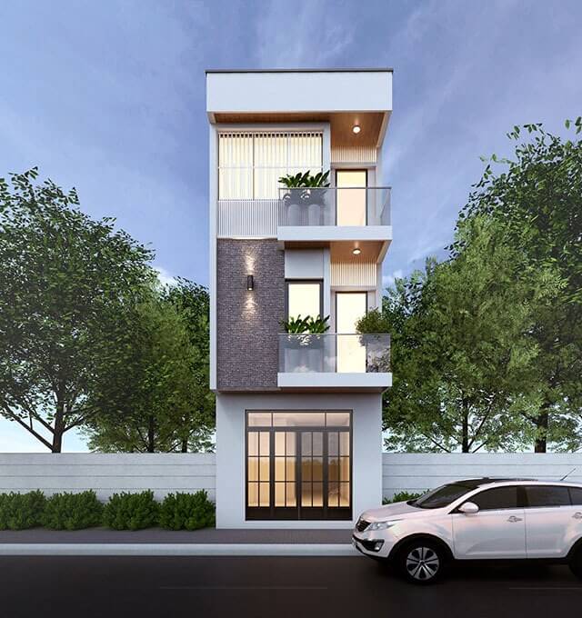 Nhà phố hiện đại 3 tầng với ô tô trắng đỗ phía trước, thiết kế ban công thoáng và cây xanh trang trí.
