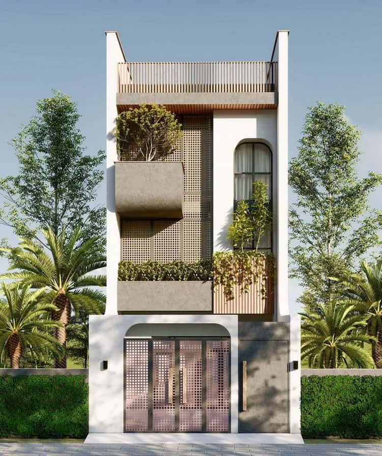 Nhà phố hiện đại 3 tầng với ban công cây xanh, cây cối xung quanh, thiết kế kiến trúc đẹp và sáng tạo.