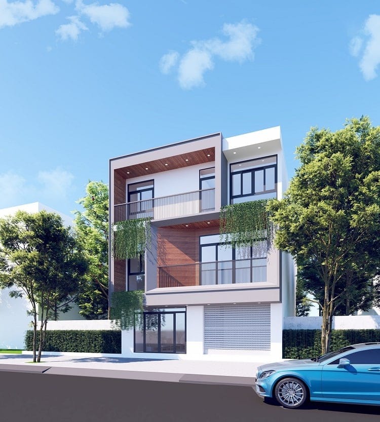Nhà phố hiện đại ba tầng với cây xanh và xe hơi màu xanh đậu phía trước, trời xanh mây trắng.