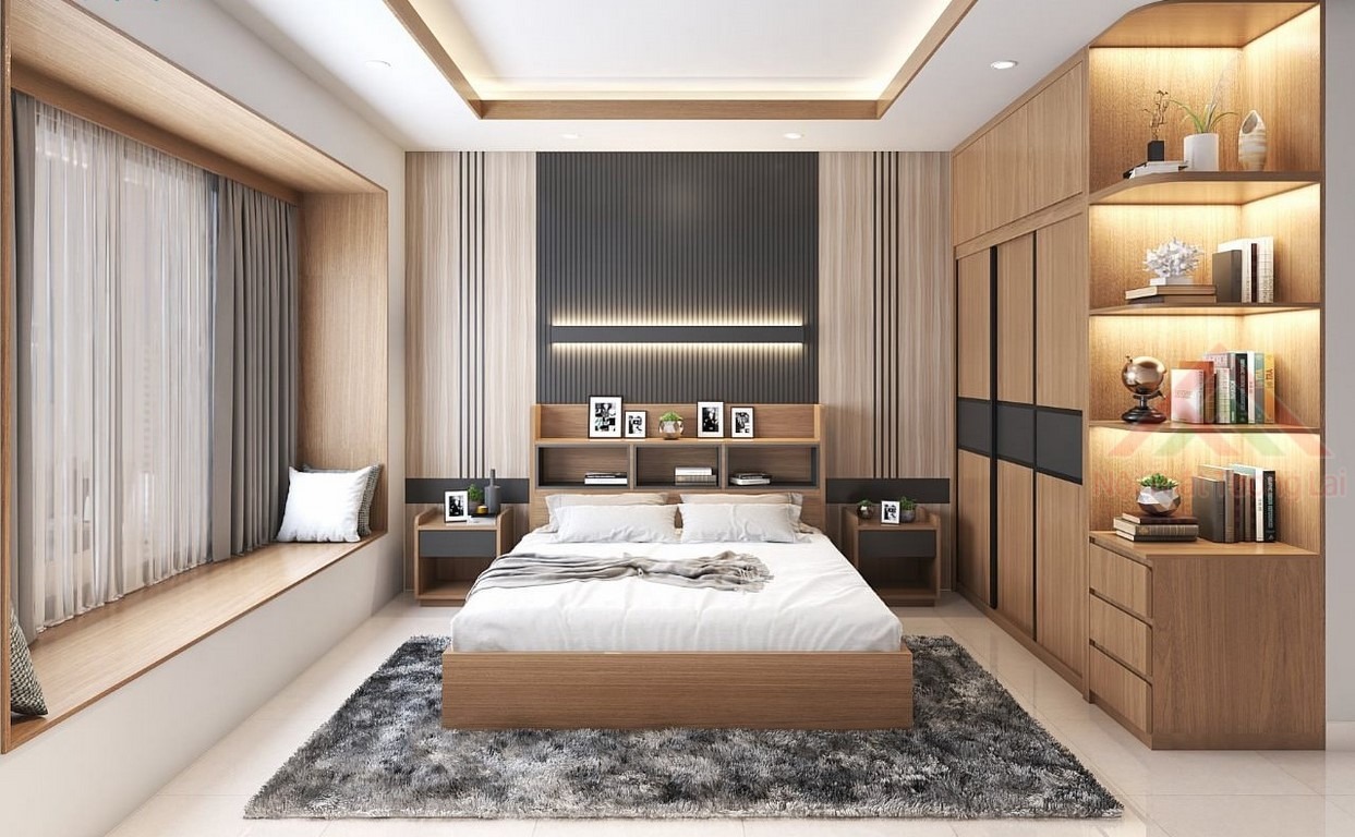 Phòng ngủ hiện đại với giường gỗ tối giản, thảm lông xám và tủ sách trang trí ánh sáng ấm áp.