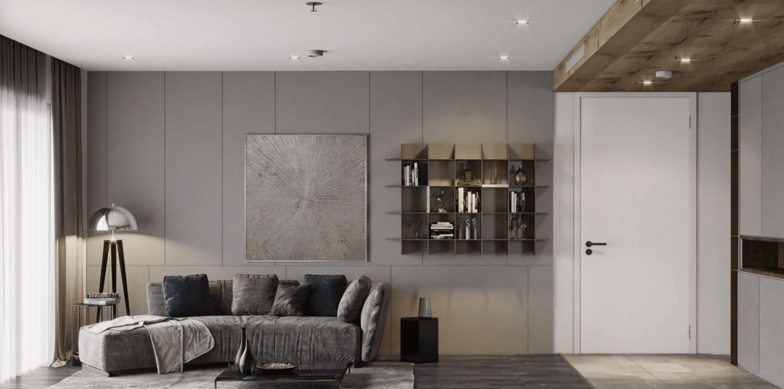 Phòng khách hiện đại với sofa xám, đèn sàn và kệ sách trang trí trên tường.