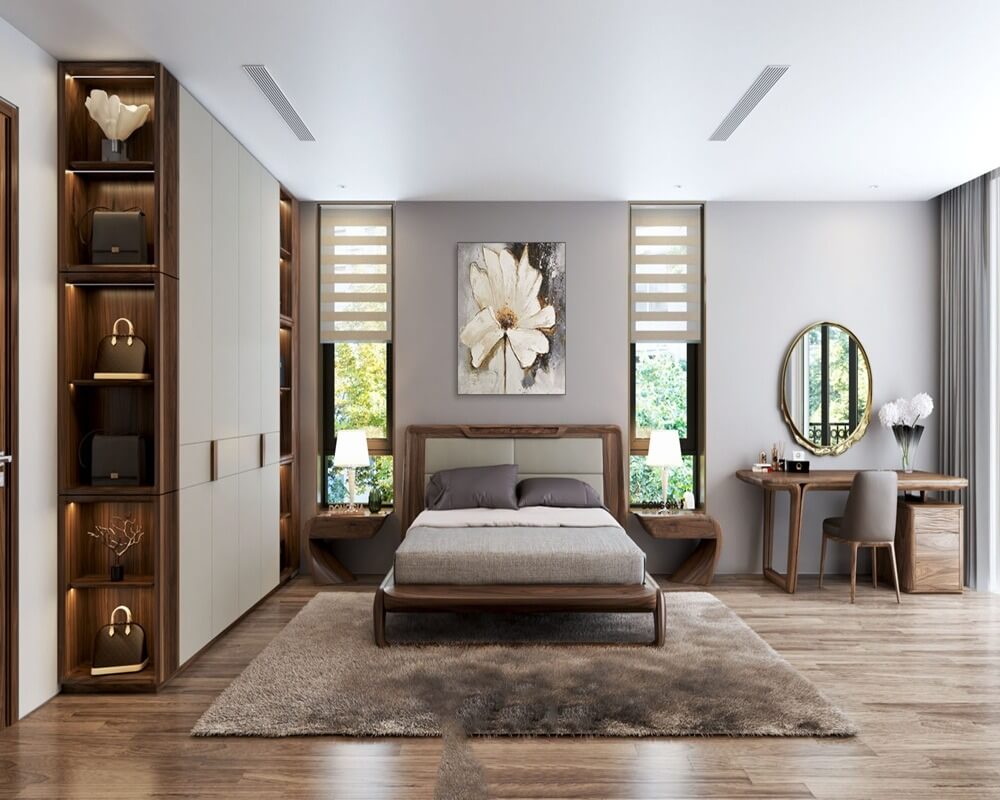 Phòng ngủ hiện đại với giường đôi, bàn trang điểm, nội thất gỗ và cây trang trí, ánh sáng tự nhiên.