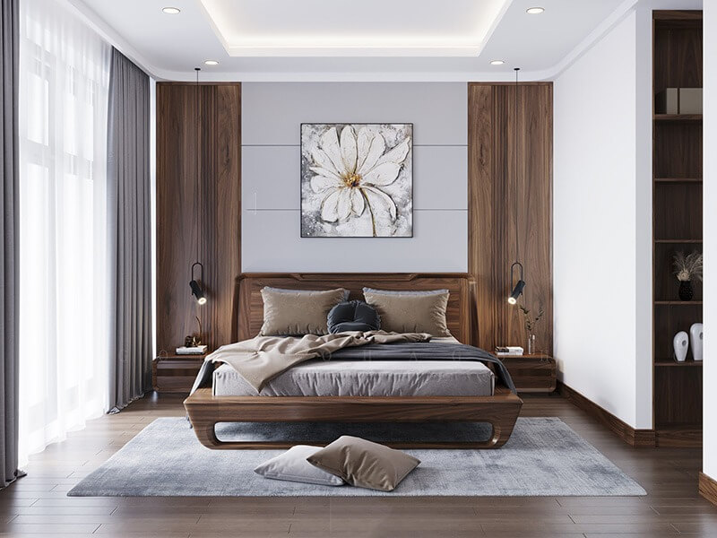 Phòng ngủ hiện đại với giường đôi gỗ, tranh hoa trên tường và ánh sáng tự nhiên từ cửa sổ lớn.