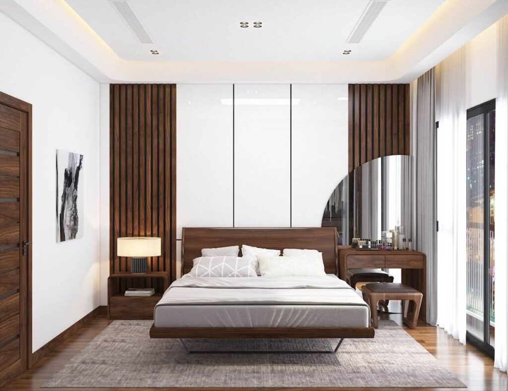 Phòng ngủ hiện đại với giường gỗ, đèn ngủ, và cửa sổ lớn, tạo không gian thoáng sáng và sang trọng.