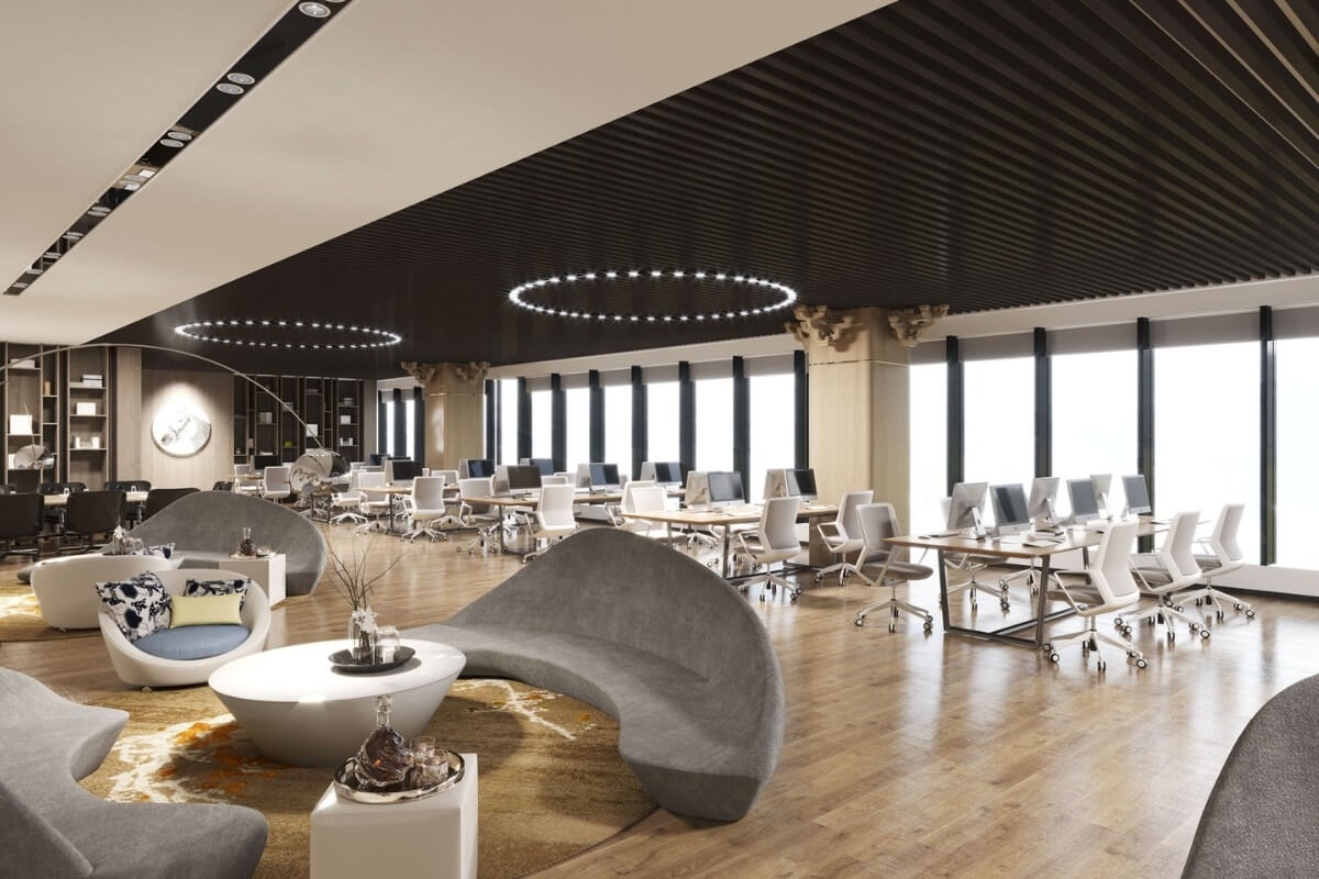 Văn phòng hiện đại với nội thất sang trọng, ghế thoải mái và ánh sáng tự nhiên từ cửa sổ lớn.