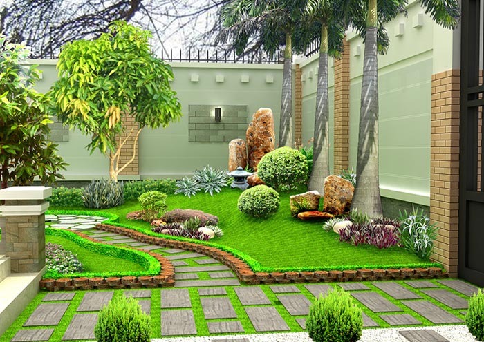 Sân vườn xanh mát với cây cối, đá trang trí và lối đi lát gạch, tạo không gian thư giãn trong khuôn viên biệt thự.