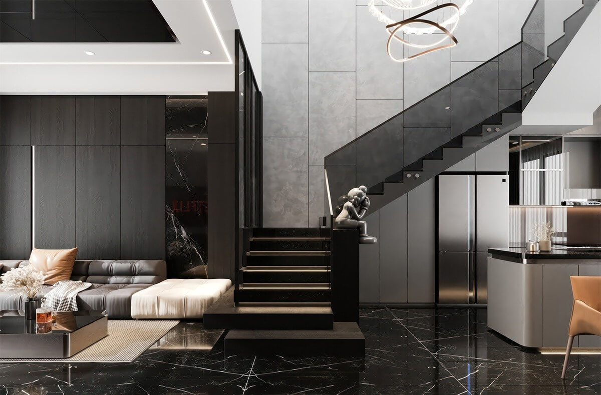 Phòng khách hiện đại với cầu thang phong cách và nội thất sang trọng, mang tông màu đen và xám chủ đạo.