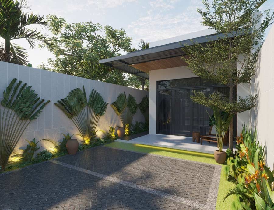 Sân vườn nhỏ với cây xanh và ghế ngồi, tường bao quanh tạo không gian thư giãn hiện đại và thoáng mát.