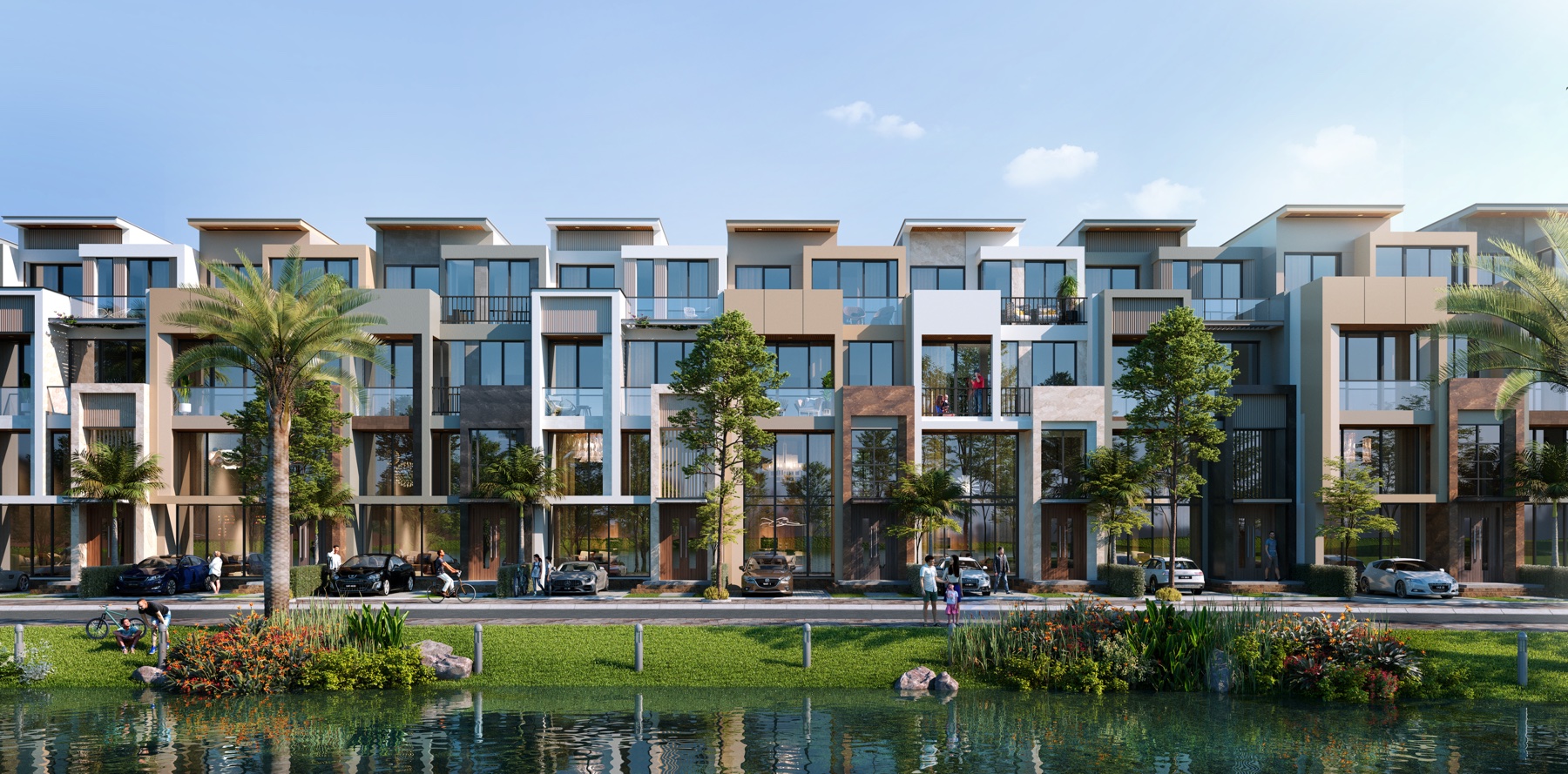 the-9stellars3 Dãy nhà hiện đại bên sông, cây cối và xe hơi xung quanh, trời xanh trong.