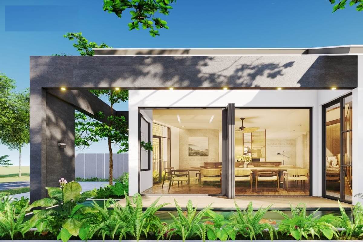 Ngôi nhà hiện đại với cửa kính lớn và không gian xanh bên ngoài, dưới bầu trời xanh sáng.