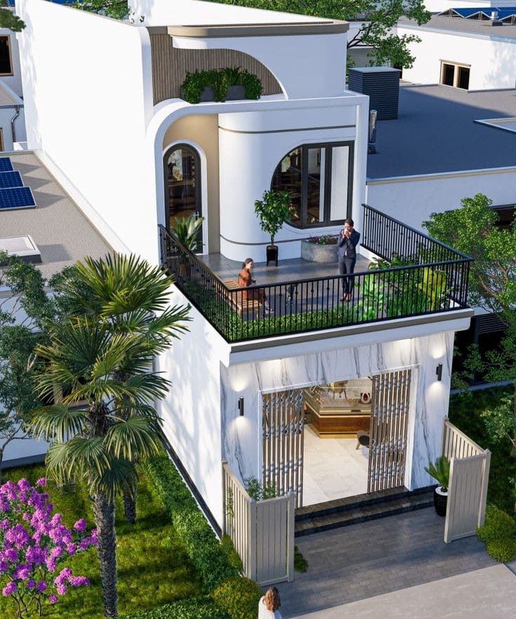 Ngôi nhà hiện đại với sân thượng, cây xanh và cửa lớn, kiến trúc đẹp mắt, hài hòa với thiên nhiên xung quanh.