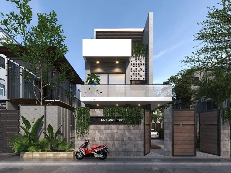 Ngôi nhà hiện đại, hai tầng với cây xanh và xe máy đỏ phía trước, thiết kế kiến trúc sang trọng.