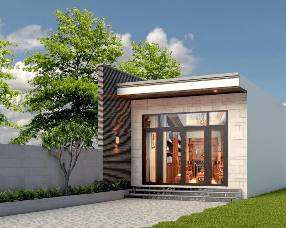 Nhà cấp 4 hiện đại với cửa kính lớn, sân vườn rộng, cây xanh tạo không gian thoáng đãng.