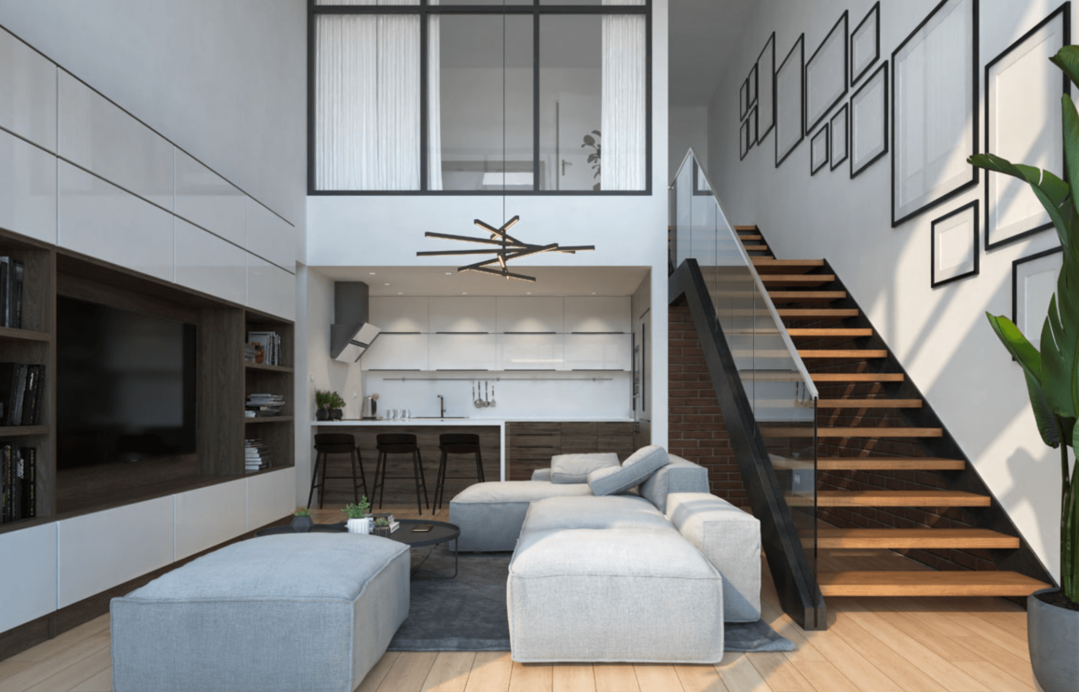 Phòng khách hiện đại với sofa xám, bếp mở và cầu thang gỗ. Thiết kế nội thất tối giản và tinh tế.