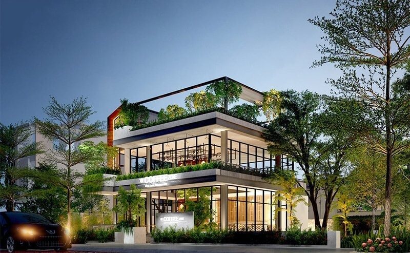 Quán cà phê hiện đại giữa cây xanh với thiết kế kiến trúc mở, sang trọng và thư giãn.