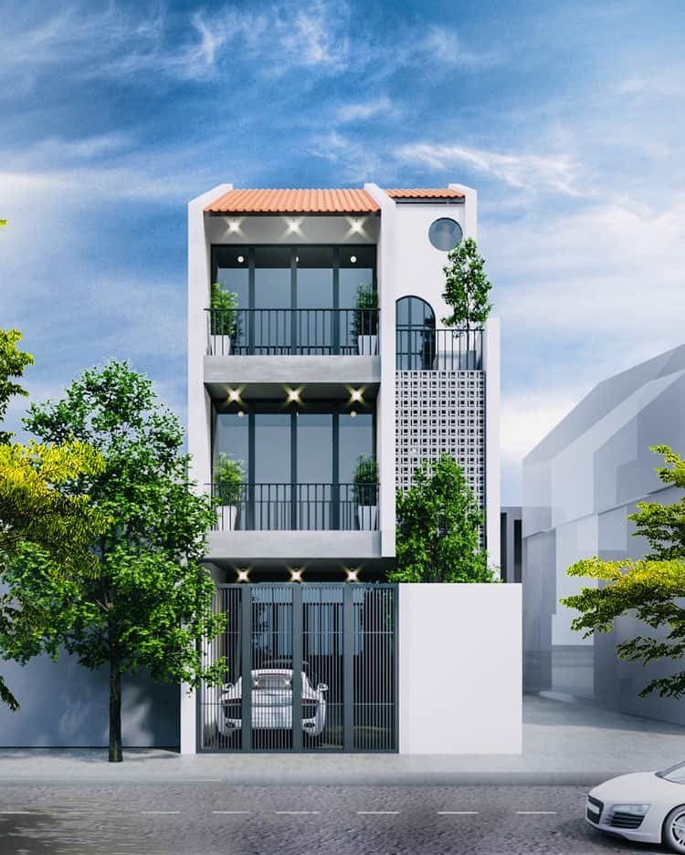 Nhà phố 3 tầng hiện đại với kính lớn và cây xanh, tạo không gian sống thoáng đãng và tinh tế trong đô thị.