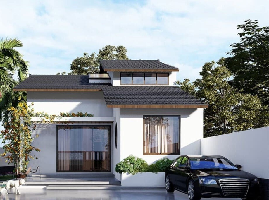 Ngôi nhà hiện đại màu trắng, mái ngói đen, sân rộng với xe hơi đen đỗ trước, cây xanh xung quanh.