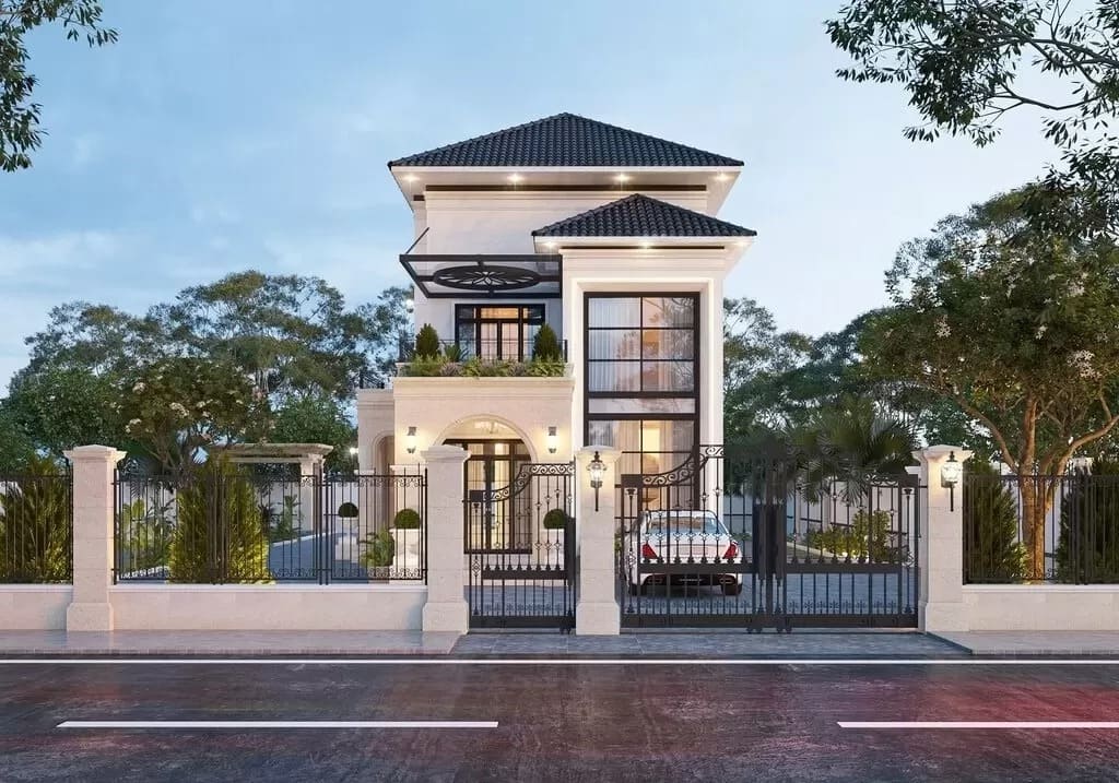 Ngôi nhà biệt thự 3 tầng hiện đại với sân vườn rộng rãi, cổng sắt và cây xanh xung quanh.