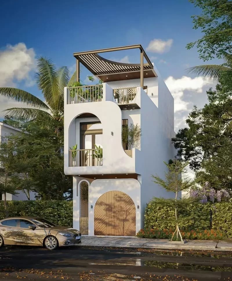 Nhà phố hiện đại ba tầng với kiến trúc độc đáo và cây xanh xung quanh, dưới bầu trời xanh nắng đẹp.