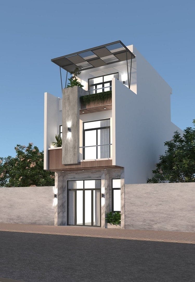 Nhà phố hiện đại 3 tầng với thiết kế tối giản, mặt tiền kính và cây xanh trang trí ban công.