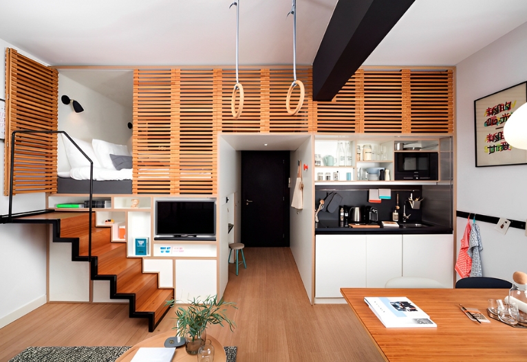 Căn hộ studio hiện đại với nội thất gỗ và gác lửng phong cách tối giản, không gian sống tiện nghi và ấm cúng.