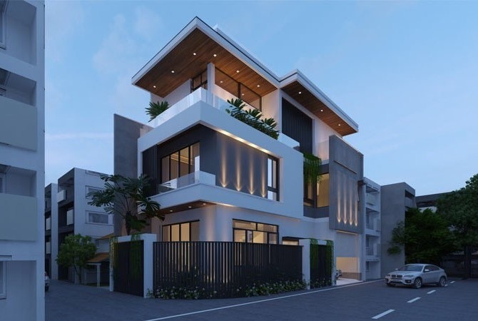 Nhà hiện đại ba tầng với thiết kế tối giản, ban công rộng, cây xanh, view đường phố ban đêm.
