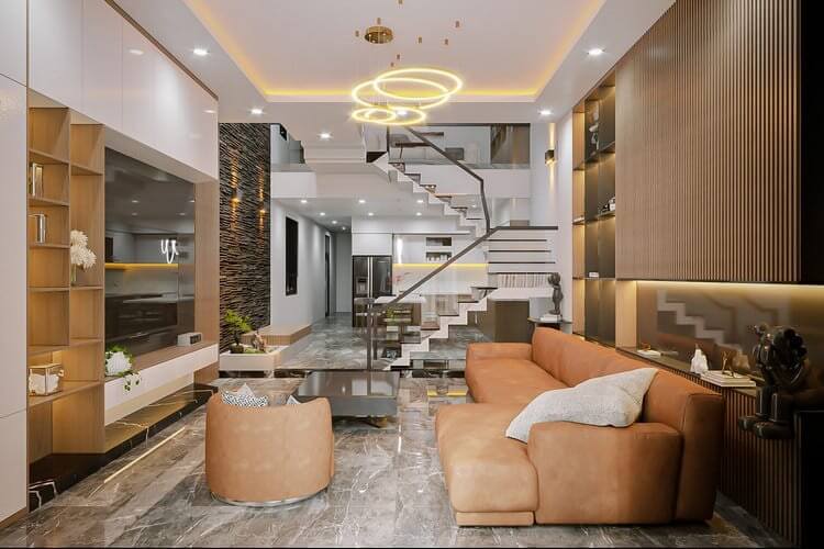 Phòng khách hiện đại với sofa da màu nâu, cầu thang kính và đèn treo trang trí sang trọng.