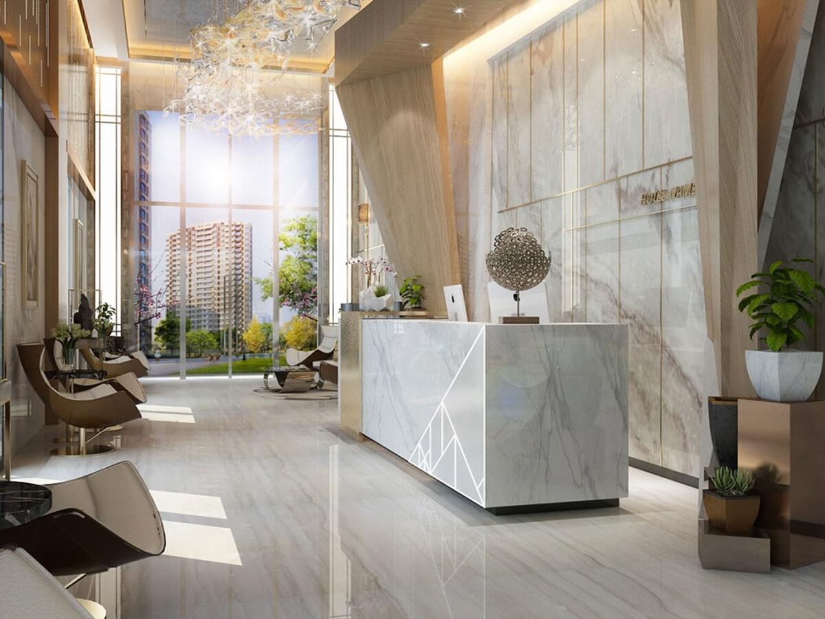 Sảnh khách sạn sang trọng với nội thất hiện đại và ánh sáng tự nhiên, nhìn ra tòa nhà cao tầng ở phía xa.