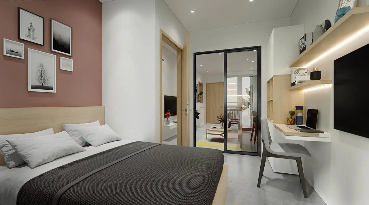 Phòng ngủ hiện đại với giường đôi, bàn làm việc và trang trí tường nghệ thuật. Bên cạnh là phòng khách thoáng đãng.