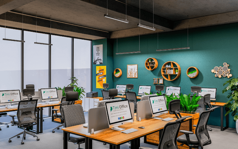 thiet-ke-phong-giam-doc-ket-hop-chung-voi-khong-gian-lam-viec-cong-ty Văn phòng hiện đại với dàn máy tính và bàn ghế, cây xanh trang trí, không gian làm việc mở, ánh sáng tự nhiên.