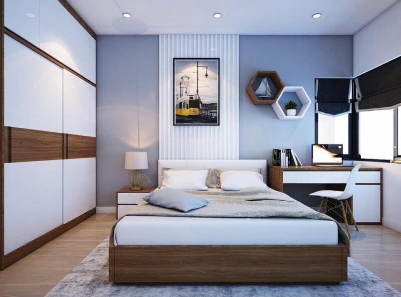 Phòng ngủ hiện đại với giường đôi, bàn làm việc và tranh treo tường, tông màu trắng và gỗ tự nhiên.