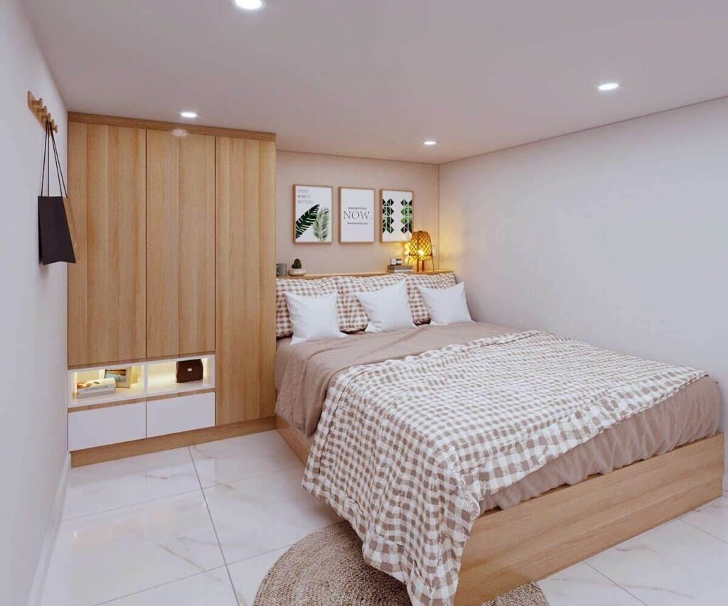 Phòng ngủ hiện đại với nội thất gỗ, giường đôi, đèn trang trí, và tranh treo tường, tạo không gian ấm cúng.