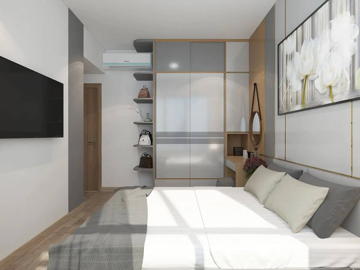 Phòng ngủ hiện đại với giường, tủ quần áo, tranh tường hoa sen và tivi treo tường.