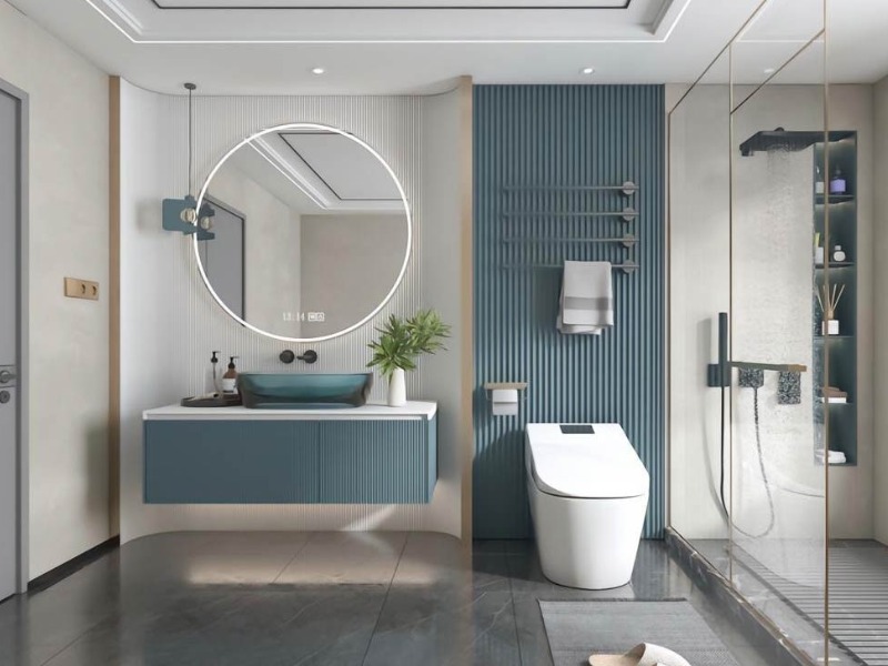 tieu-chuan-lap-dat-thiet-bi-cho-phong-tam-dien-tich-vua Phòng tắm hiện đại với gương tròn, bồn rửa màu xanh thanh lịch và buồng tắm kính.