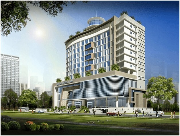 Tòa nhà hiện đại với kiến trúc độc đáo, không gian thoáng đãng, cây xanh bao quanh, nằm trong khu đô thị sôi động.