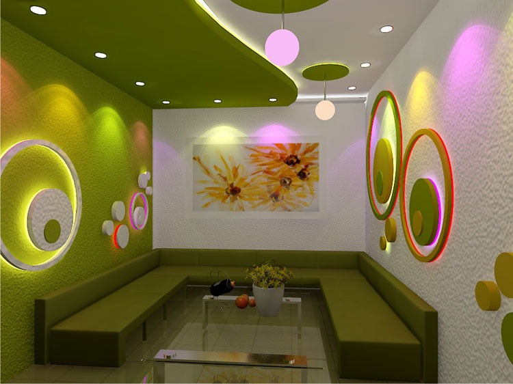 tran-thach-cao-cach-am-karaoke-1 Phòng khách hiện đại với đèn màu sắc, tranh hoa và sofa xanh, tạo không gian sáng tạo và ấm cúng.