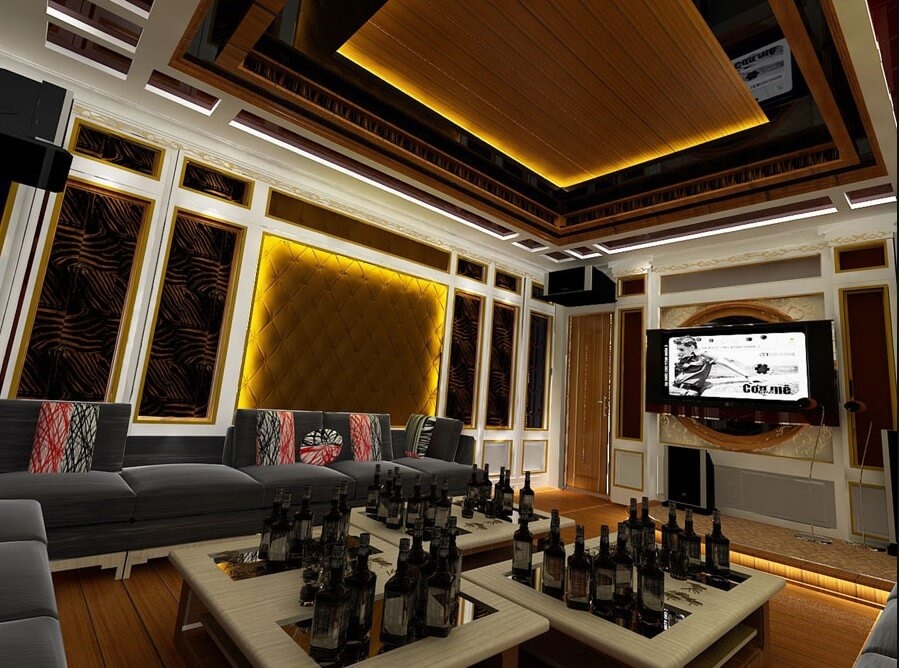 tran-thach-cao-cach-am-karaoke-2 Phòng karaoke sang trọng với nội thất hiện đại và bàn đầy rượu, ánh sáng dịu nhẹ tạo không gian ấm cúng.